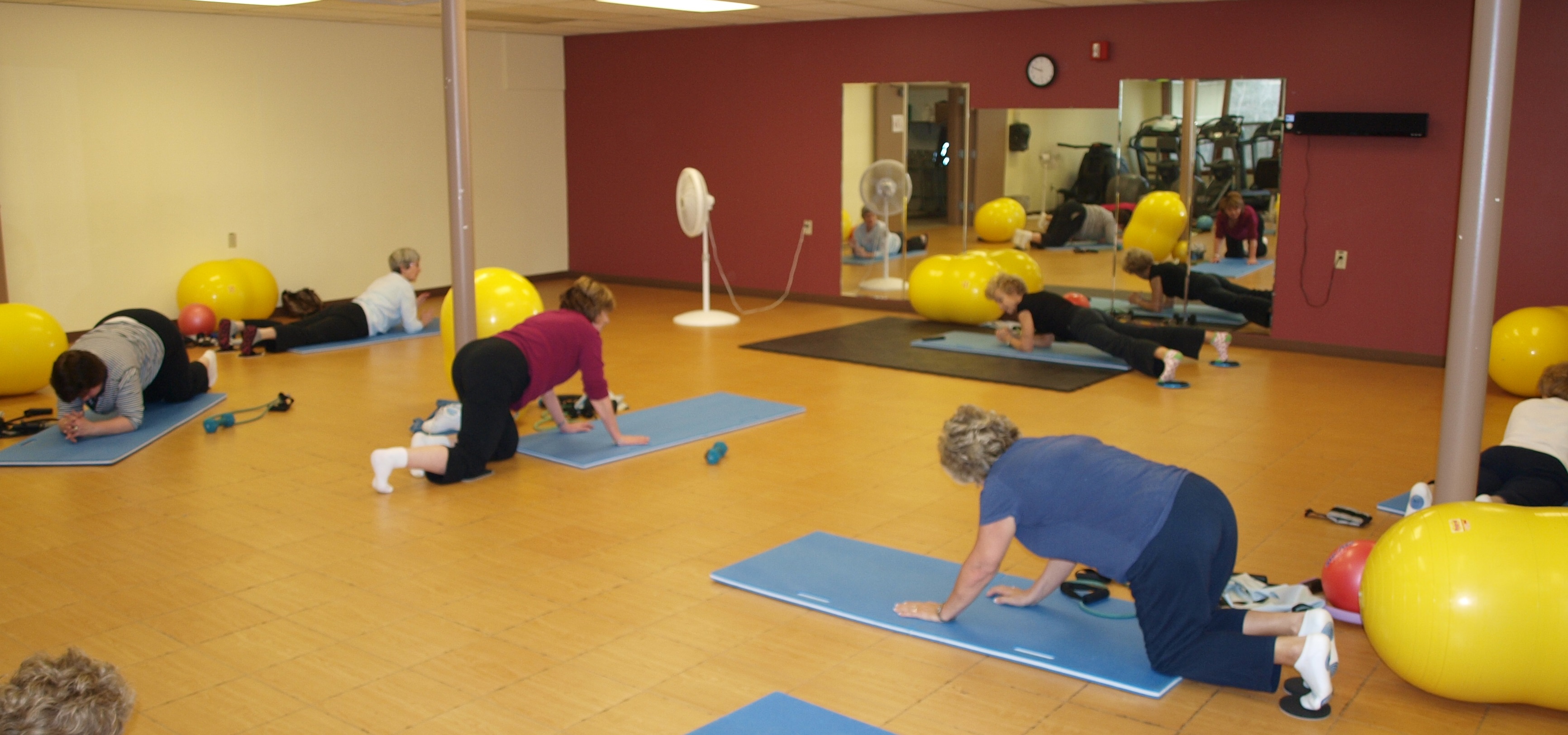 Members taking part in a floor exercise class