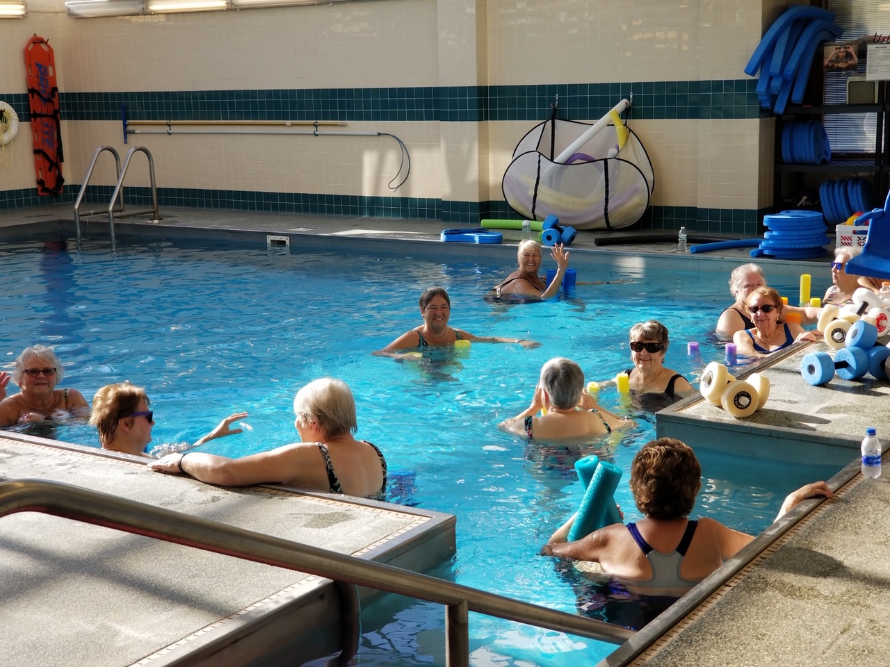Members taking part in a class in the warm-water exercise pool